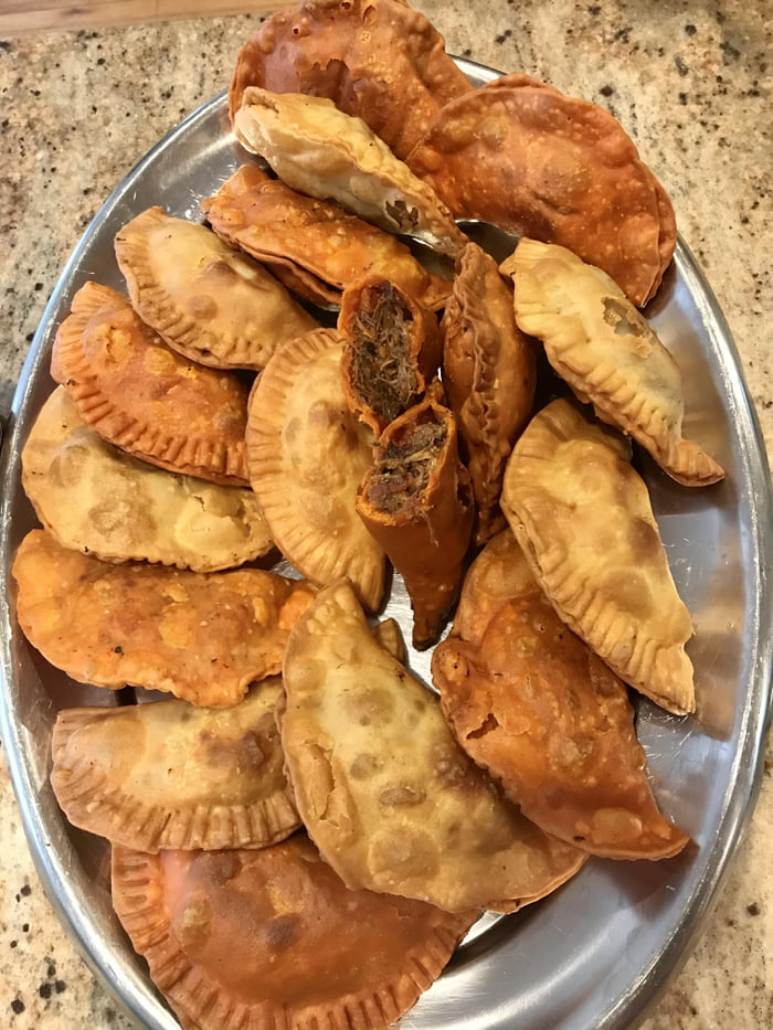 Empanadas with beef brisket and raisin filling. 9GAG