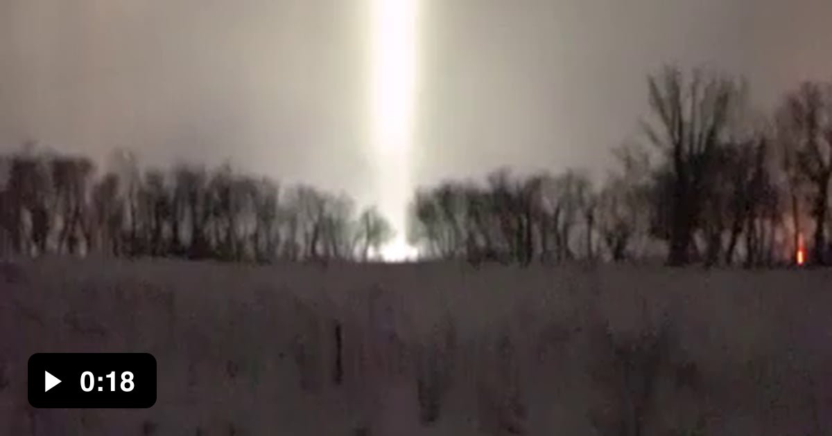 An incredibly bright light pillar during 60km/h winds and -30°C ...