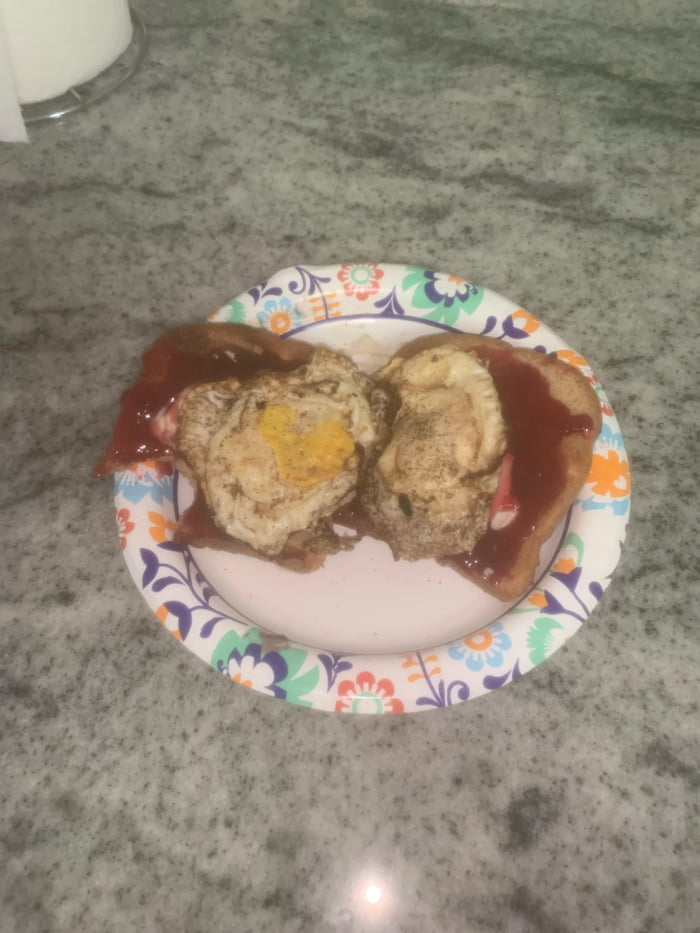 Fried eggs on toast with grape jelly - 9GAG
