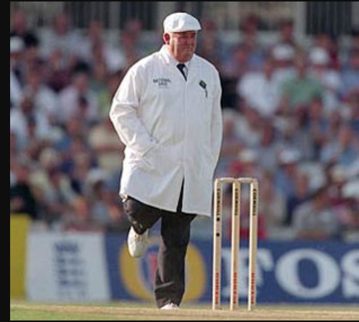 Legendary Englsih Cricket Umpire David Shepherd standing on one leg. He ...