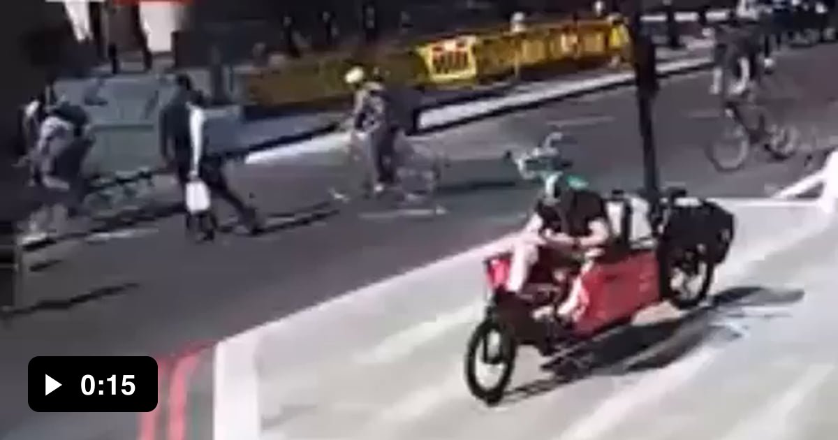 Cyclist runs red light then proceeds to headbutt the man he nearly ran ...