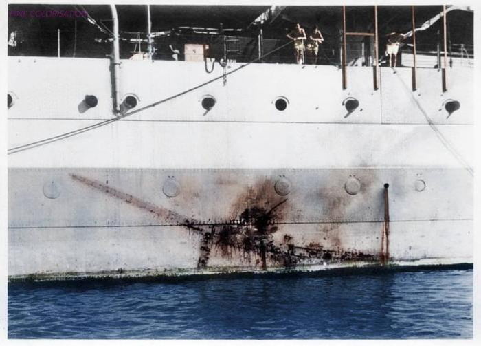 A direct hit from a kamikaze plane unable to penetrate the hull of an