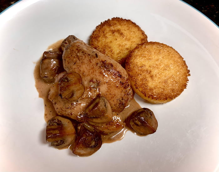 Chicken thigh with mushrooms in a garlic Dijon pan sauce with crispy