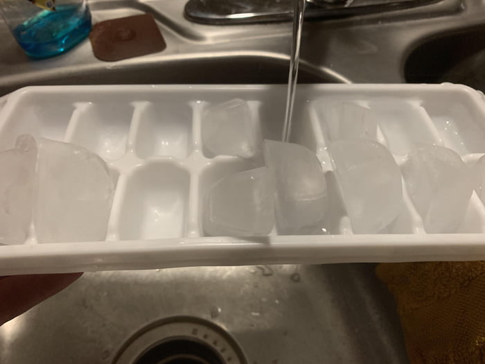 Get more Ice out of ice tray when refilling by flipping remaining cubes