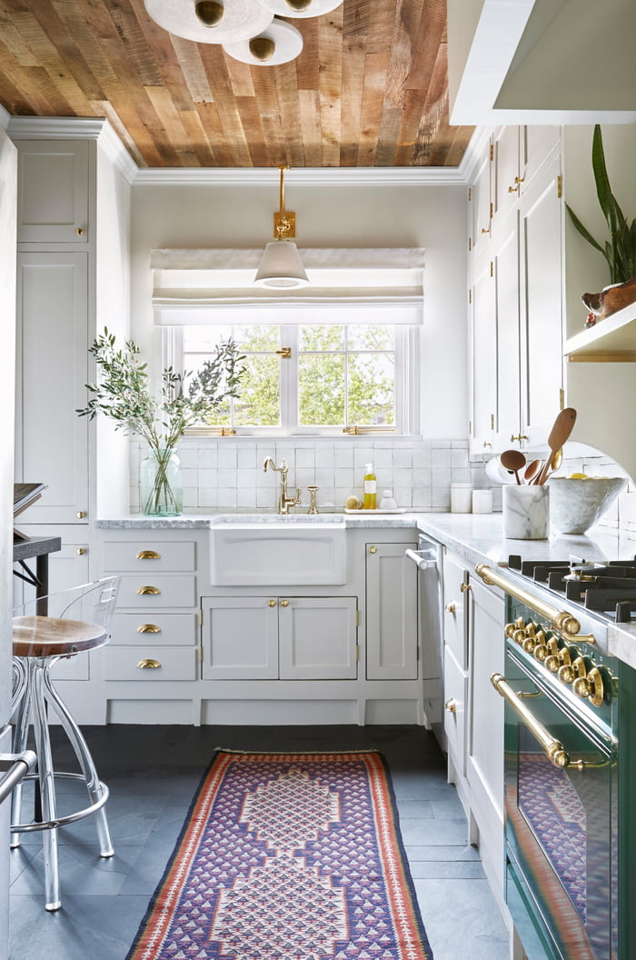 Kitchen with white terracotta tile backsplash in a renovated 1920s ...