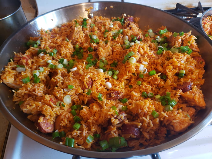 Spicy andouille sausage & chicken thigh tomato based jambalaya! 9GAG