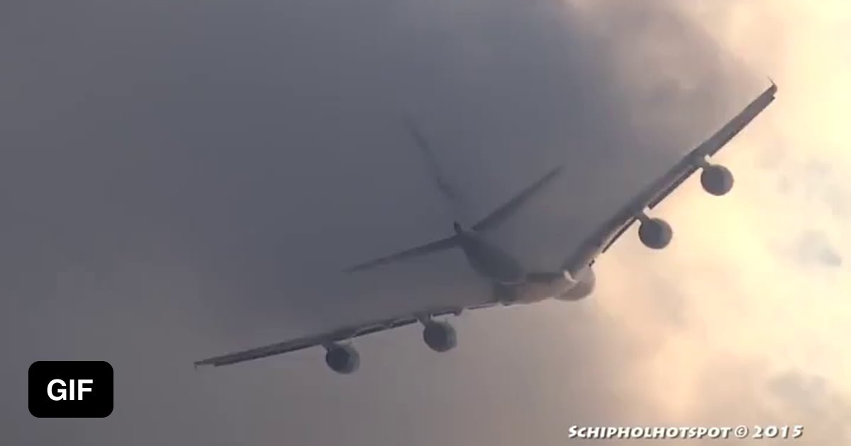 A plane cutting through the clouds - 9GAG