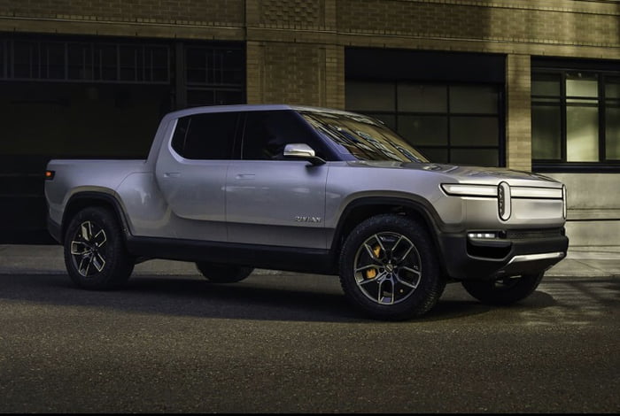 Rivian EV Ute. Would buy this and fit a massive bull bar to the front ...