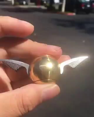 golden snitch finger spinner