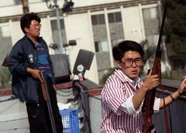 Koreans protecting their store during the 1992 LA Riots - 9GAG