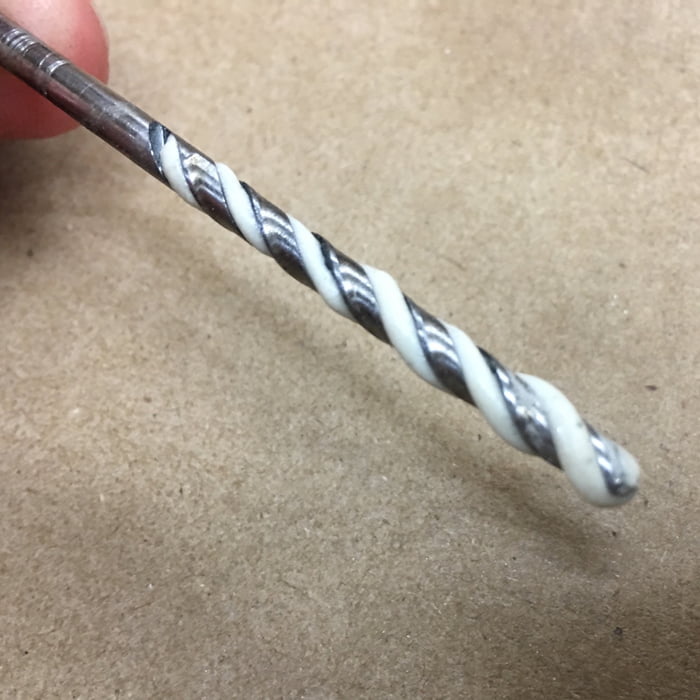 I used this old drill bit to clean out a spray foam can nozzle. It