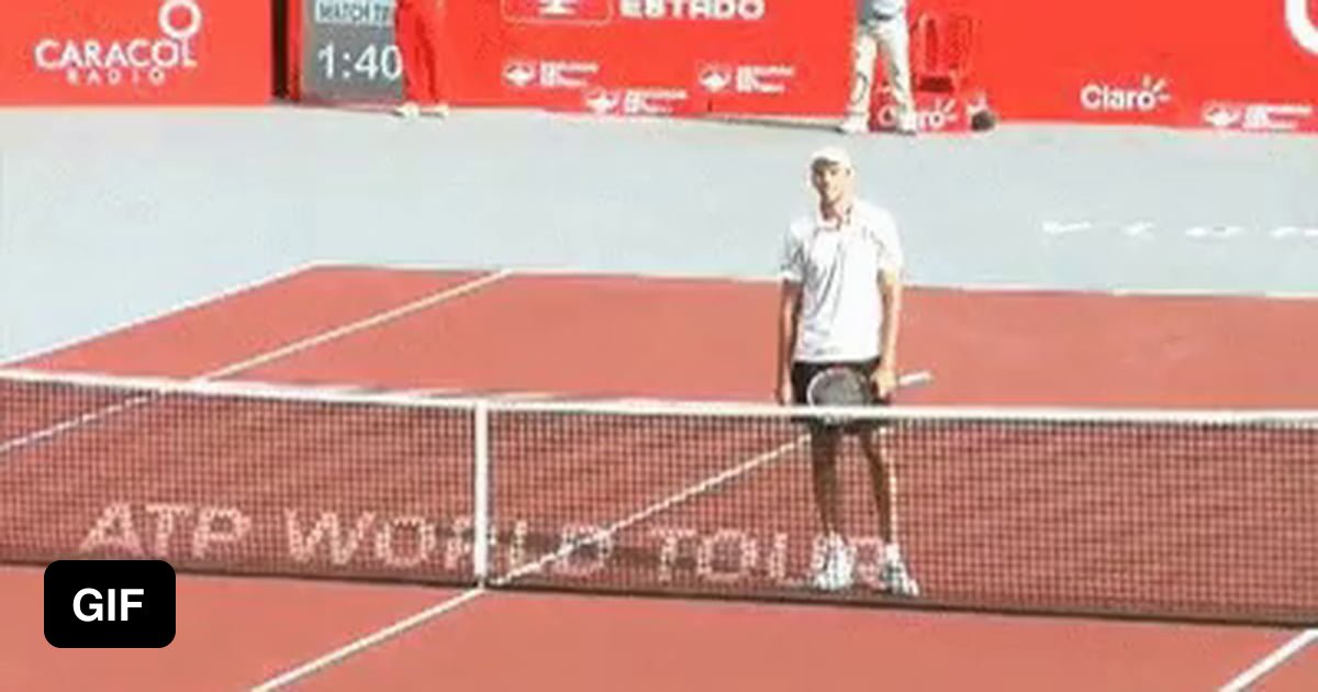 5'9" Dudi Sela grabbing a chair for a boost to hug 6'11" Ivo Karlovic