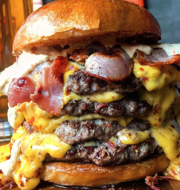 Quadruple patty Burger with garlic,onions,cheese and bacon with a home made burger sauce 9GAG