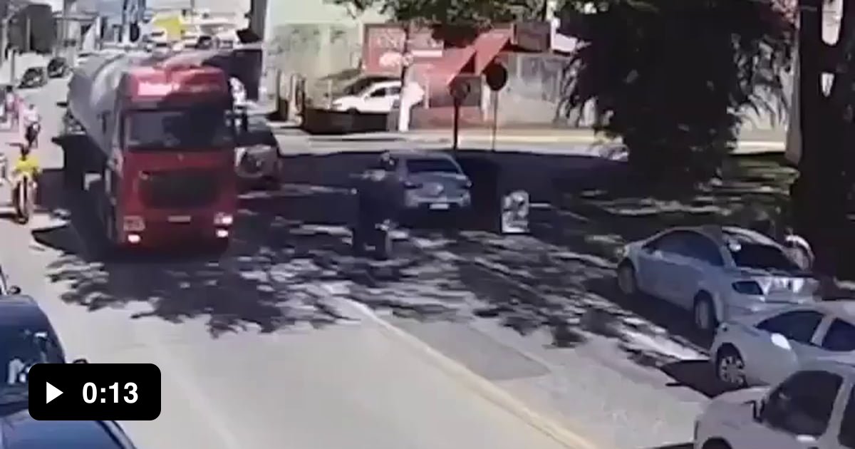 Biker crashes into open car door, gets run over by another vehicle 9GAG