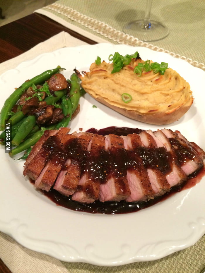 Sous vide duck breast with fig and blackberry reduction, green beans ...