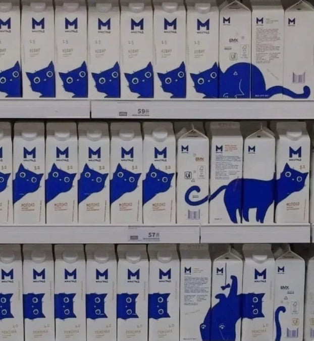 The sides of these milk cartons line up to create a cute image ) 9GAG
