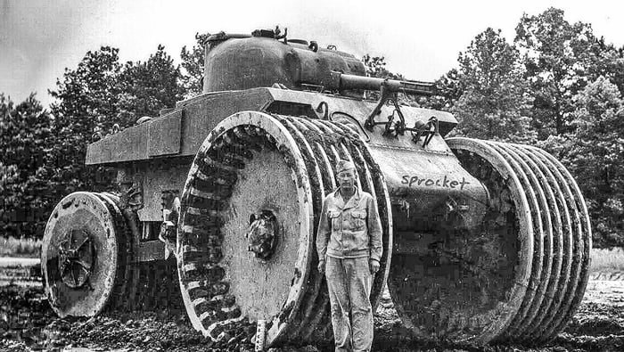 American soldier at the Sherman M4A2 tank equipped with a T10 system ...