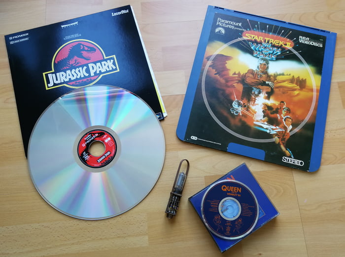 two-old-movie-formats-left-is-a-laserdisc-on-the-right-side-is-a-ced