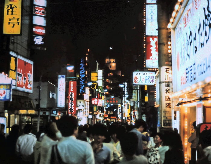 Illuminated advertising signs near Shinjuku station in Tokyo, Japan ...