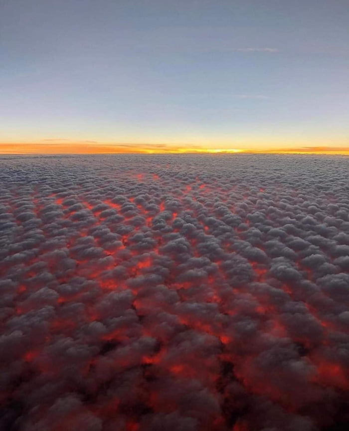 this-is-what-a-sunset-looks-like-from-above-altocumulus-clouds-at