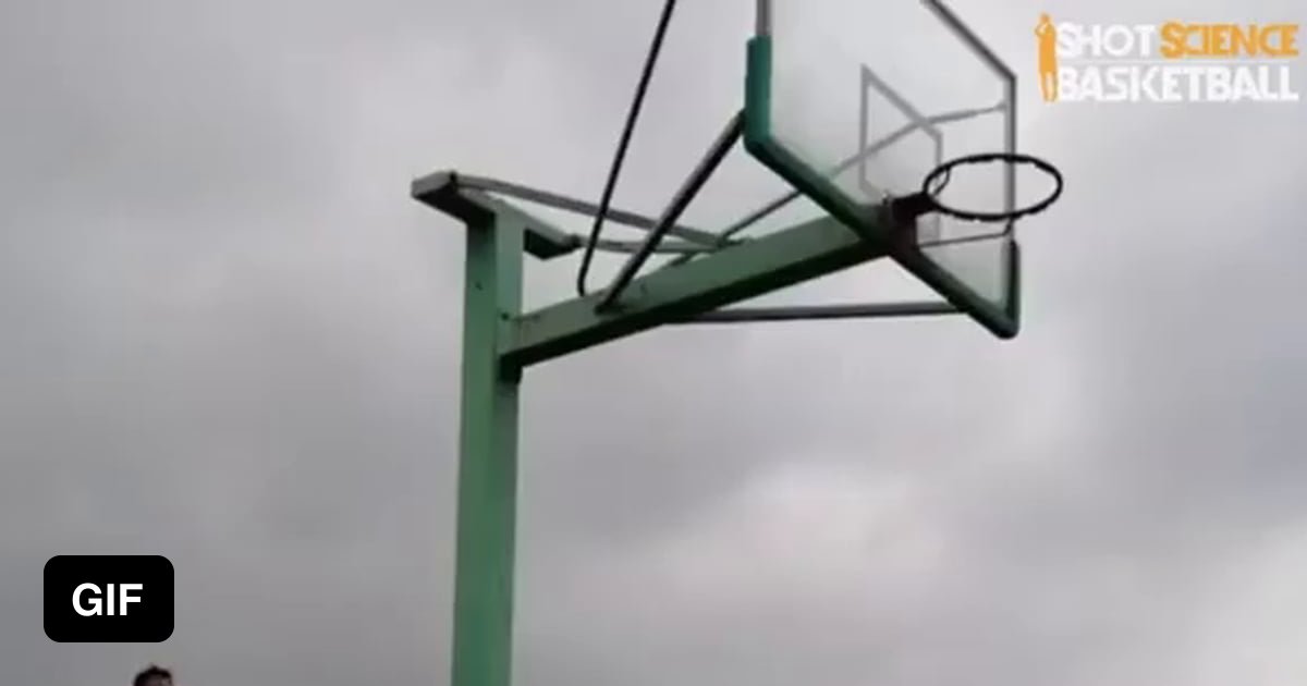 Basketball player gets ball stuck on hoop and loses both shoes trying