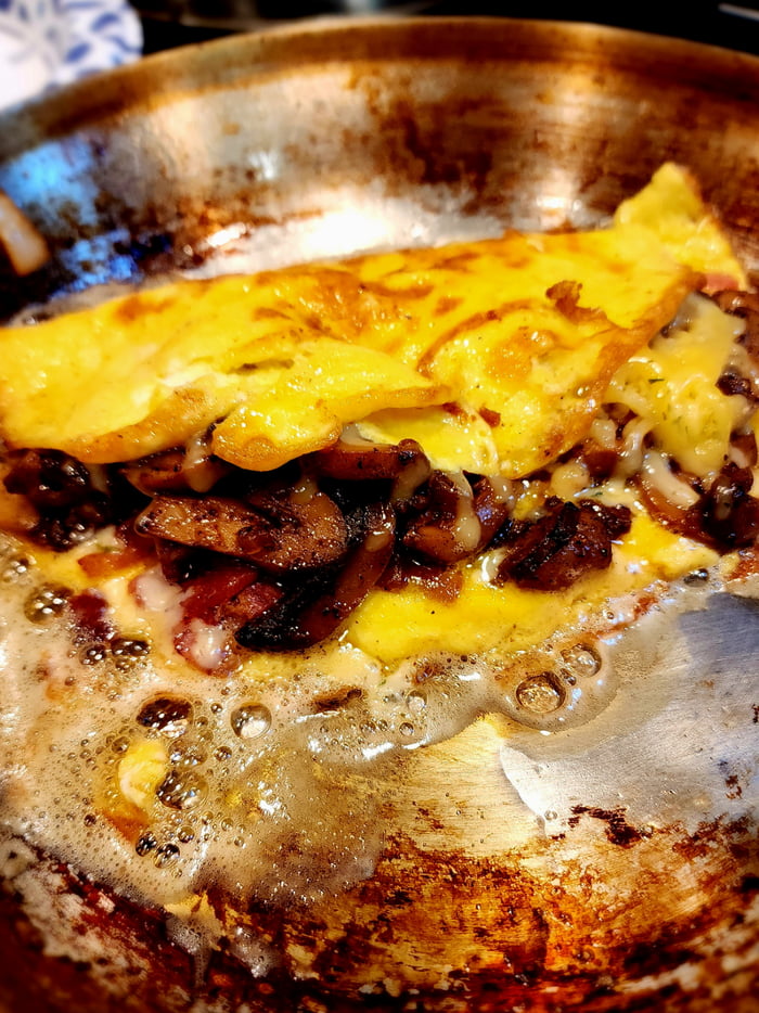 Mushroom, onion, bacon omelet with Havarti cheese. 9GAG