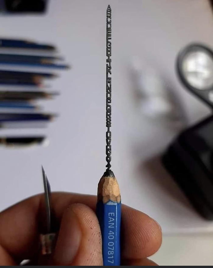 the-entire-alphabet-carved-in-a-lead-pencil-9gag