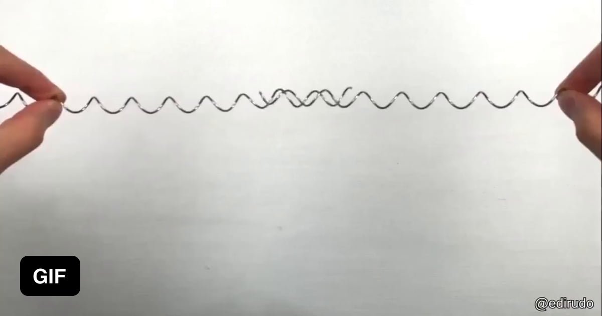 Guy pulling two never ending springs - 9GAG