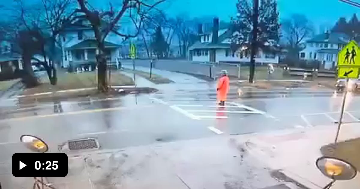 Crossing Guard in Maryland saves child from being hit by a car - 9GAG