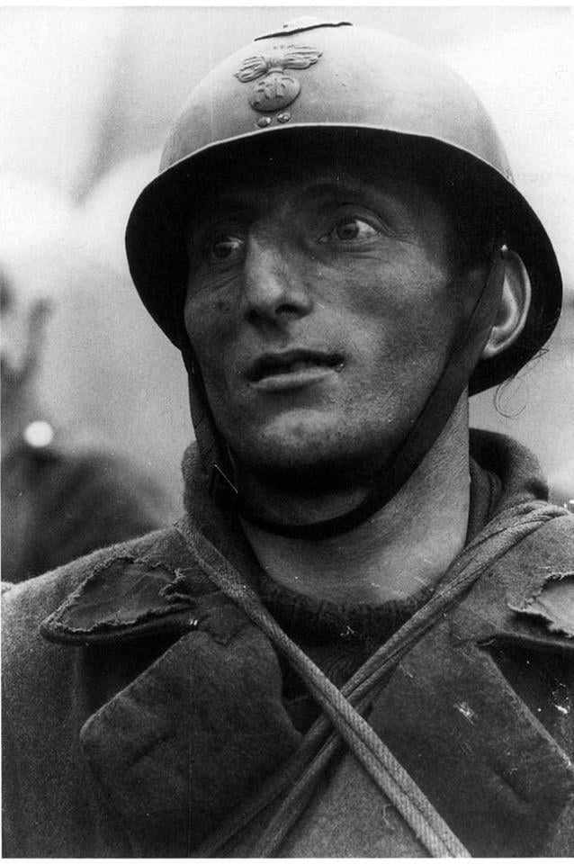 A French POW in May 1940 displaying the one thousand-yard stare after ...