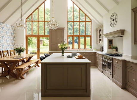 Unique Kitchen With A Cathedral Ceiling And Ample Natural Light In
