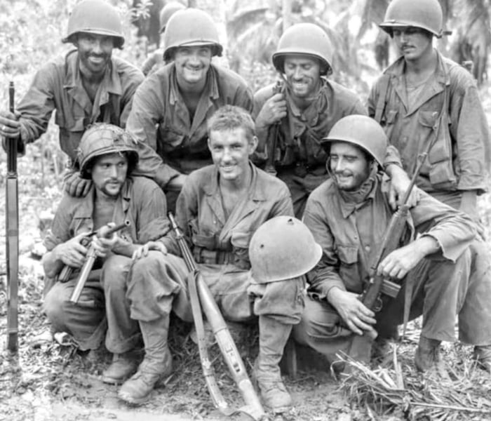 Private William N. Wade, of Fort Valley Georgia, displays his helmet ...