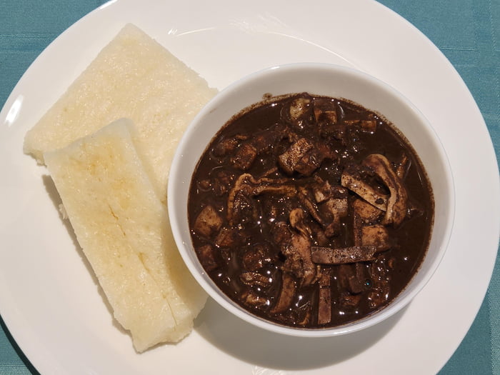Pork blood stew, paired with rice cake. A traditional dish pairing from ...