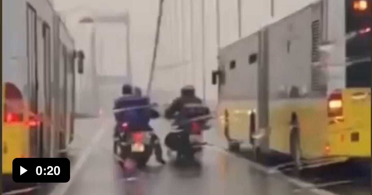 Bus drivers trying to block strong winds for the couriers so they can