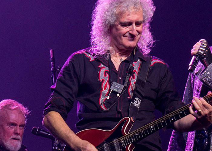 Queen guitarist Brian May uses banjo strings on his electric guitars