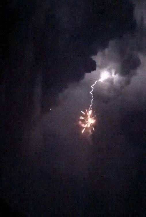 The Exact Moment When A Firework Was Struck By A Lightning 9gag