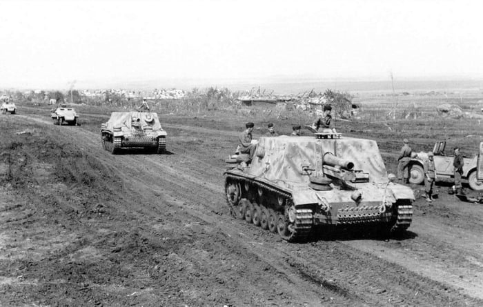 StuG 33bs on the way to Kursk, 1943. - 9GAG