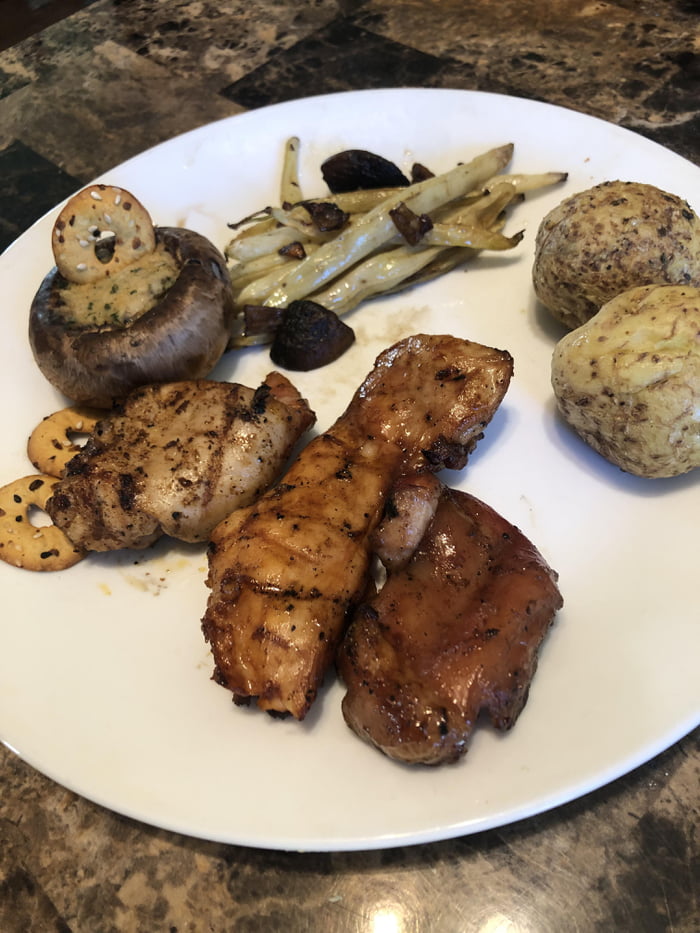 Marinaded Chicken Thighs Baked Potato Fresh Yellow Beans And A Crab Stuffed Mushroom Cap Gag