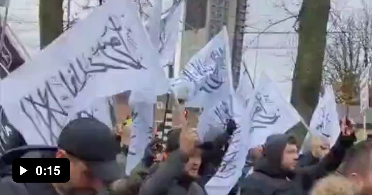 ISIS and Al-Qaeda flags are being flown by Muslim protesters marching ...