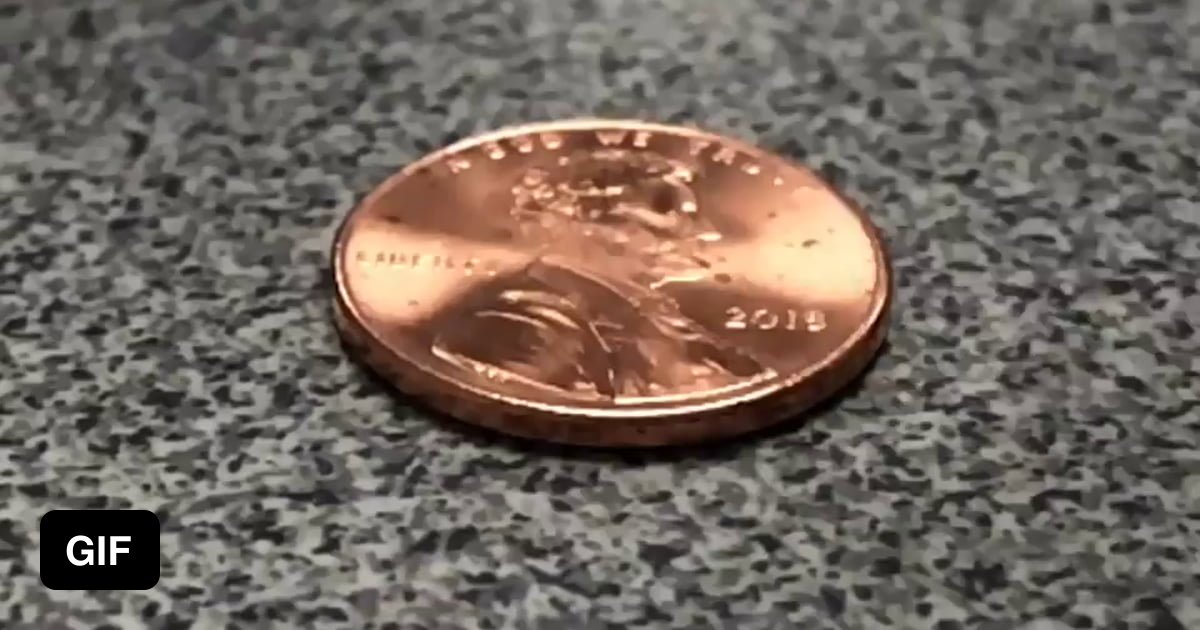 Surface tension of water on a penny 9GAG