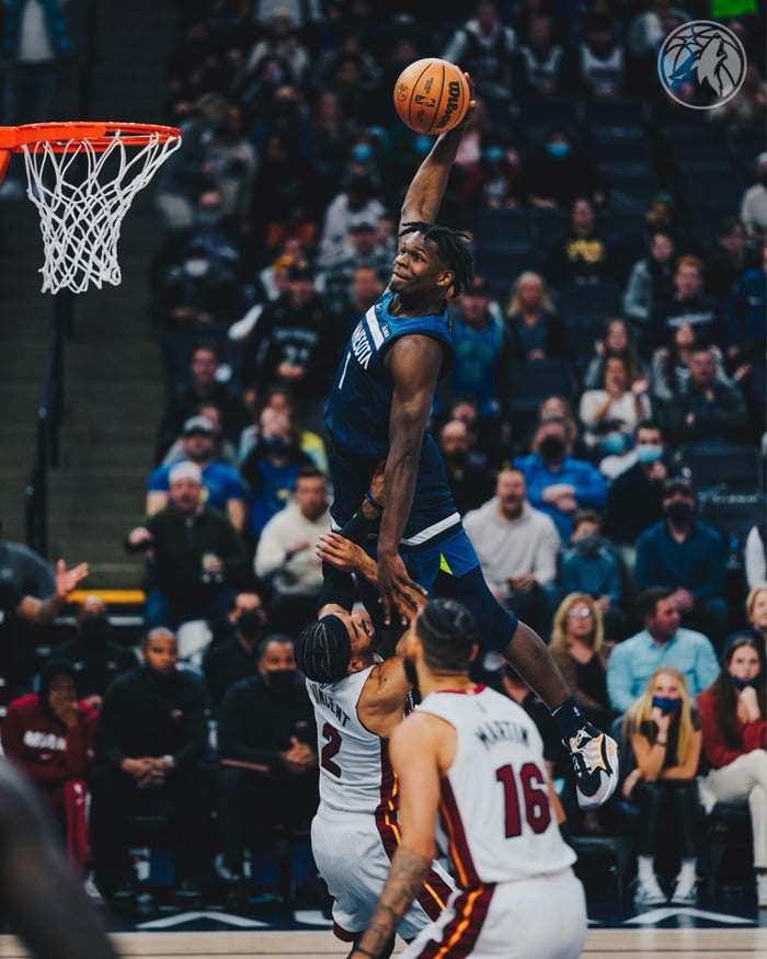 Anthony Edwards leaps over Gabe Vincent on his way to a dunk 9GAG