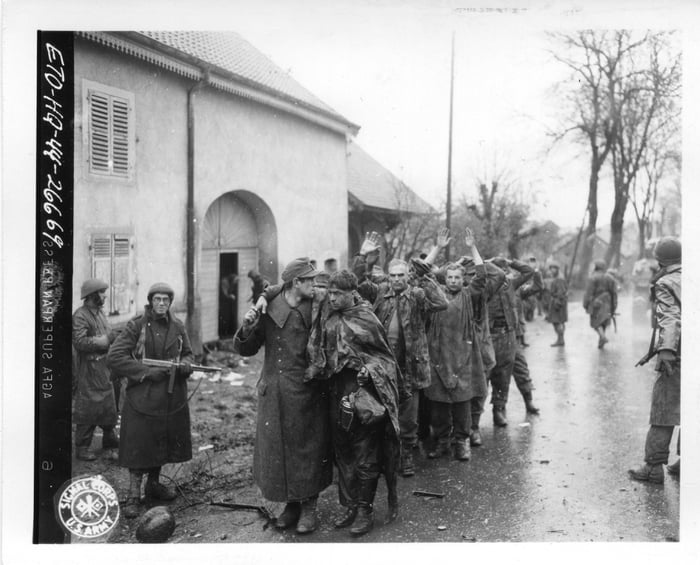 German POWs Captured In House To House Fighting Are Rounded Up By ...