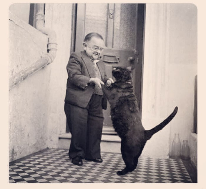 World smallest man Henry Berhens dancing with his cat in 1965 9GAG