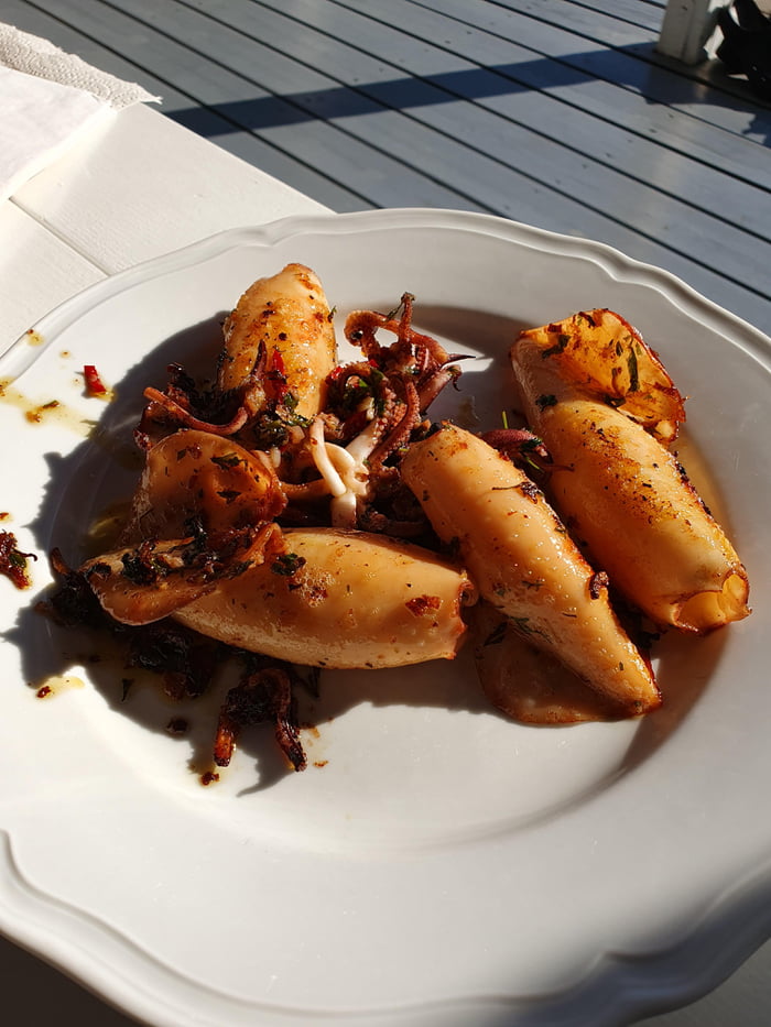 Grilled squid marinated with chili, lemon juice, garlic and cilantro - 9GAG