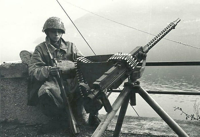 A young soldier of the Italian Social Republic with a 12.7mm Breda ...