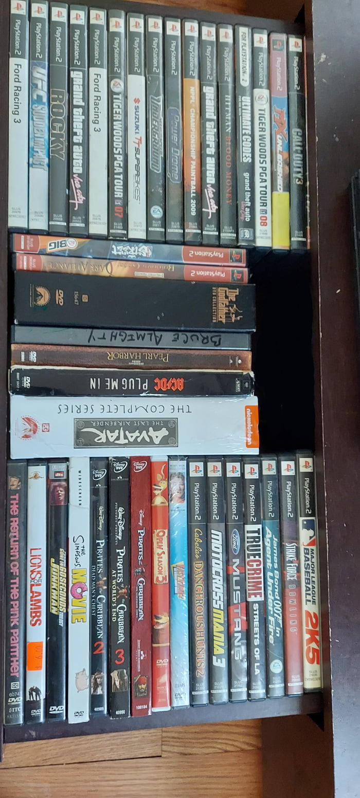 The drawer full of old ps2 games and dvds 9GAG