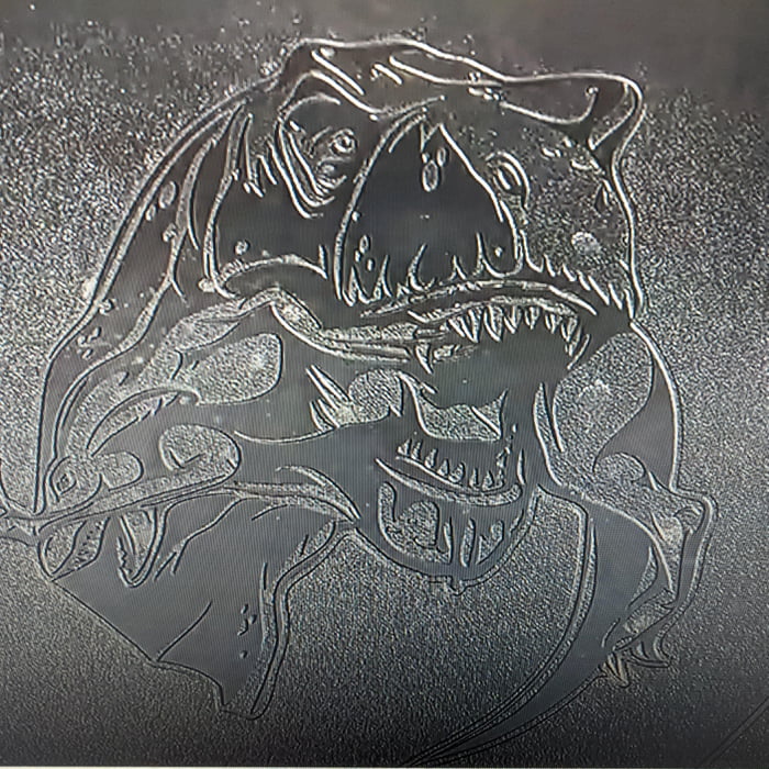 The new Dodge Ram TRX ("TRex") has an embossed image you can only see