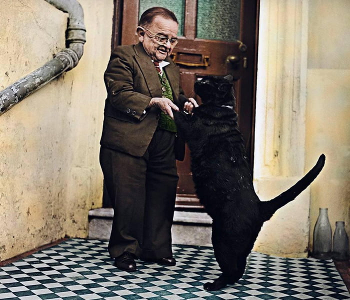 henry-behrens-the-smallest-man-in-the-world-dances-with-his-cat-in